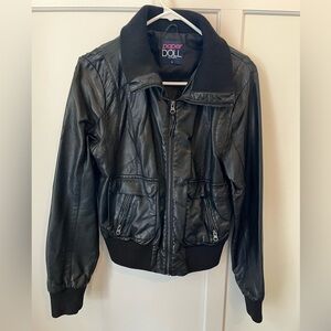 Vintage inspired, faux leather coat with large cotton color.